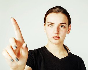 Image showing young pretty girl pointing on white background, business science