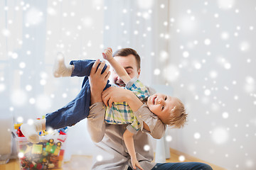 Image showing father with son playing and having fun at home