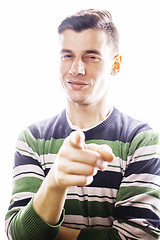 Image showing Portrait of a smart serious young man standing against white bac