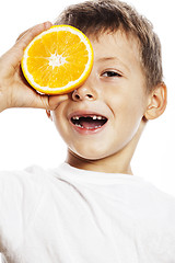 Image showing little cute boy with orange fruit double isolated on white smili