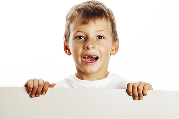 Image showing little cute boy holding empty shit to copyspace isolated close u