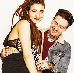 Image showing Young couple together making love, hugging. guy with tattoo, gir