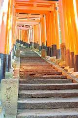 Image showing Red torii gates and stone steps at Fushimi Inari Shrine, Kyoto.