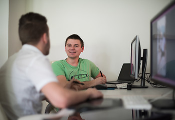 Image showing a group of graphic designers at work