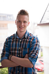 Image showing man standing at balcony