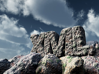 Image showing xml rock under cloudy sky - 3d rendering