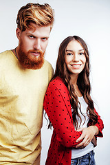 Image showing young attractive couple together having fun happy smiling isolated on white background, emotional posing, lifestyle people concept