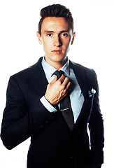 Image showing young pretty business man standing on white background, modern hairstyle, posing emotional, lifestyle people concept