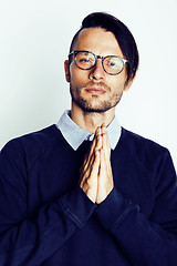 Image showing handsome middle age hipster man with modern hairstyle and tattoo, beard, close up on white background