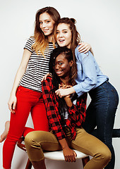 Image showing diverse multi nation girls group, teenage friends company cheerful having fun, happy smiling, cute posing isolated on white background, lifestyle people concept, african-american and caucasian