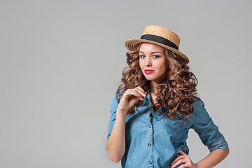 Image showing girl in sunglasses and straw