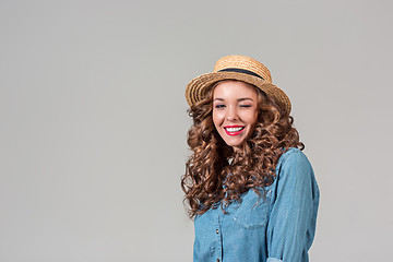 Image showing The girl in straw hat