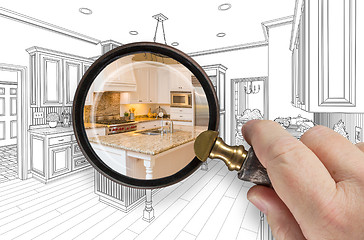 Image showing Hand Holding Magnifying Glass Revealing Custom Kitchen Design Dr