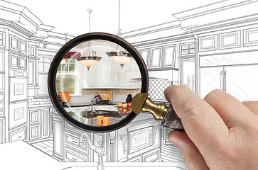 Image showing Hand Holding Magnifying Glass Revealing Custom Kitchen Design Dr