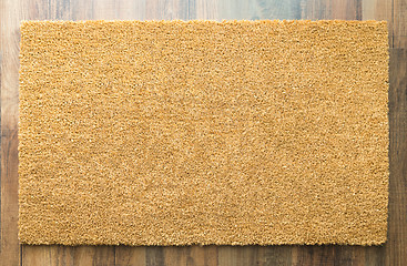 Image showing Blank Home Sweet Home Welcome Mat On Wood Floor