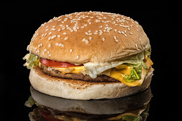 Image showing Hamburger On A Black Glass