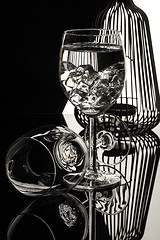 Image showing Wineglasses On A Black Glass Studio Background