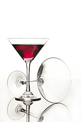 Image showing Wineglasses On A Black Glass Studio Background