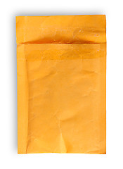 Image showing Open used yellow envelope top view