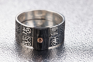 Image showing Handmade jewelry on a black glass