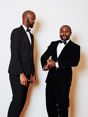 Image showing two afro-american businessmen in black suits emotional posing, g