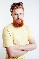 Image showing young handsome hipster bearded guy looking brutal isolated on white background, lifestyle people concept