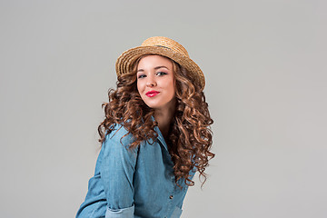 Image showing The girl in straw hat