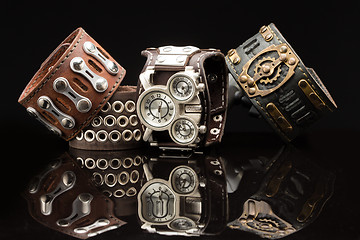 Image showing unusual watches. several alternatives dials