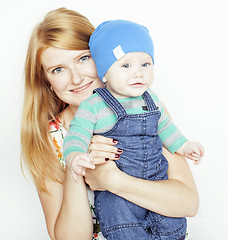 Image showing young beauty mother with cute baby, red head happy modern family isolated on white background close up, lifestyle people concept