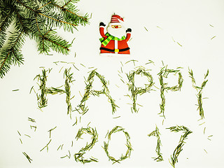Image showing happy new year design on white background with pine tree and santa claus