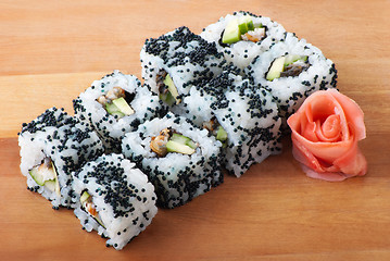 Image showing california sushi rolls on wooden plate