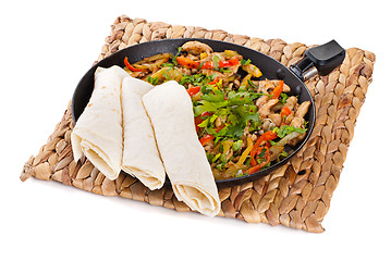 Image showing traditional mexican beef fajitas with tortillas