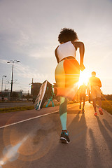 Image showing multiethnic group of people on the jogging