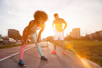 Image showing multiethnic group of people on the jogging