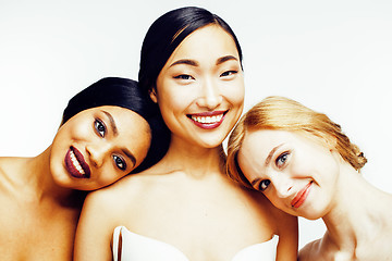 Image showing three different nation woman: asian, african-american, caucasian together isolated on white background happy smiling, diverse type on skin, lifestyle people concept