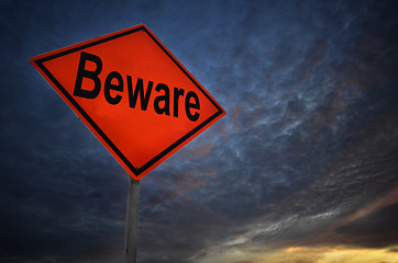 Image showing Orange storm road sign of Beware