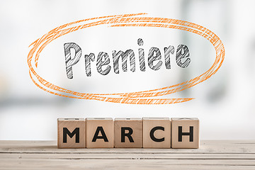 Image showing March premiere with a wooden sign