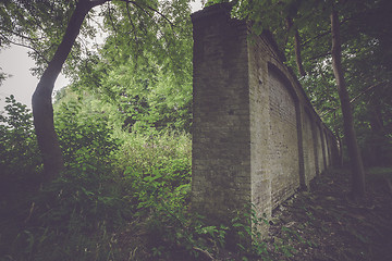 Image showing Tall dark brick wall