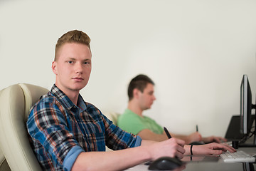 Image showing a group of graphic designers at work