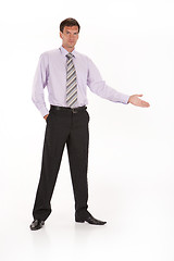 Image showing Young Businessman On An Isolated Studio Background