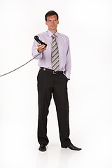 Image showing Young Businessman On An Isolated Studio Background