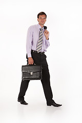 Image showing Young Businessman On An Isolated Studio Background