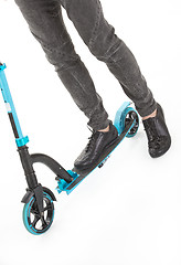 Image showing Man's Legs On Push-cycle