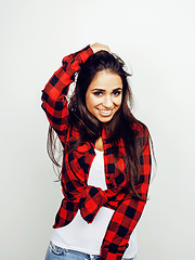 Image showing young happy smiling latin american teenage girl emotional posing on white background, lifestyle people concept