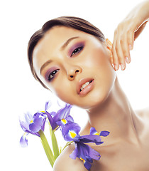 Image showing young pretty asian woman with flower purple orchid close up isol