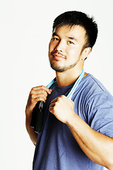 Image showing young asian guy with skipping rope on white background ready to 