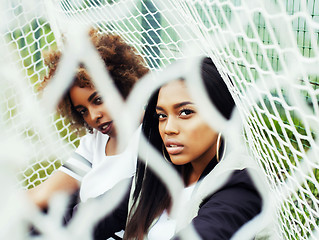 Image showing young pretty multi ethnicity afro-american girls having fun on f