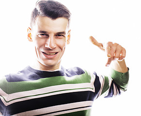 Image showing Portrait of a smart serious young man standing against white bac