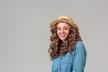 Image showing The girl in straw hat