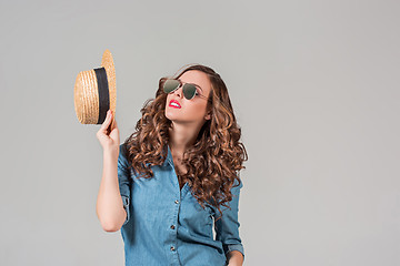 Image showing girl in sunglasses and straw